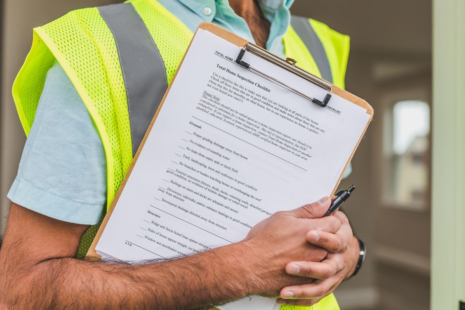 Homeowner reviewing a written estimate for home maintenance work